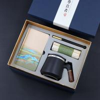 江山丝绸本+笔+普洱茶饼+陶瓷杯