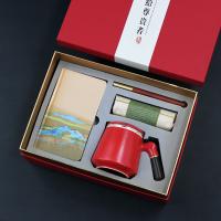 江山丝绸本+笔+普洱茶饼+陶瓷杯