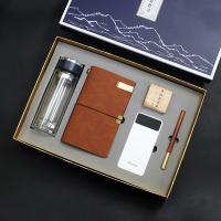 富光玻璃杯+手账本+三阶魔方+纽曼电源+笔