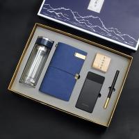 富光玻璃杯+手账本+三阶魔方+纽曼电源+笔