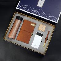 乐扣杯+手账本+三阶魔方+纽曼电源+笔